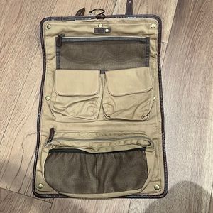 Mark and Graham hanging Dopp kit